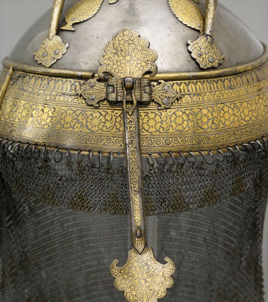 A Sikh steel helmet crafted in the Punjab, typical in style and decoration for the 19th century.