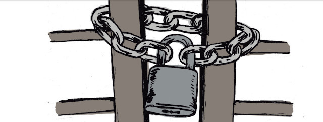 A padlock and chain across iron bars.