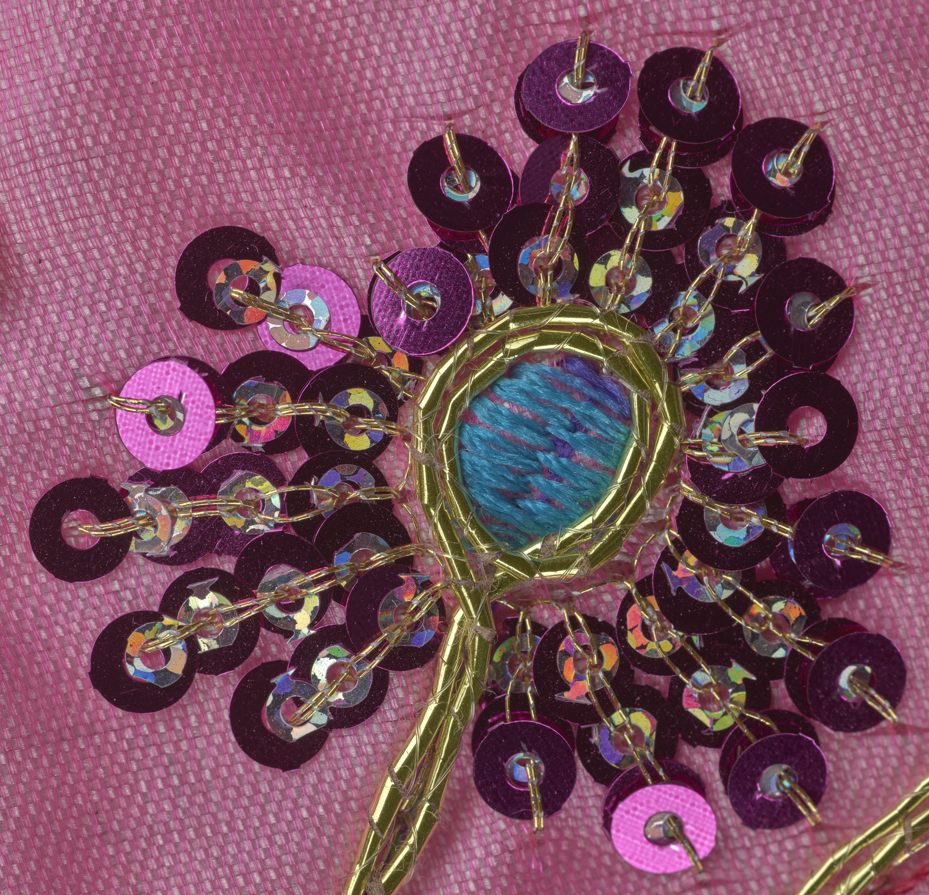 Close up detail of sequin beadwork on the Rumalla used to cover the Sri Guru Granth Sahib in the John Rylands Research Institute and Library. 