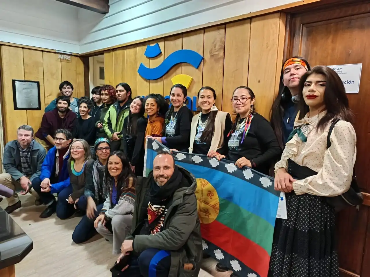 Artists, performers and researchers pose at the Radio Nacional in Bariloche.