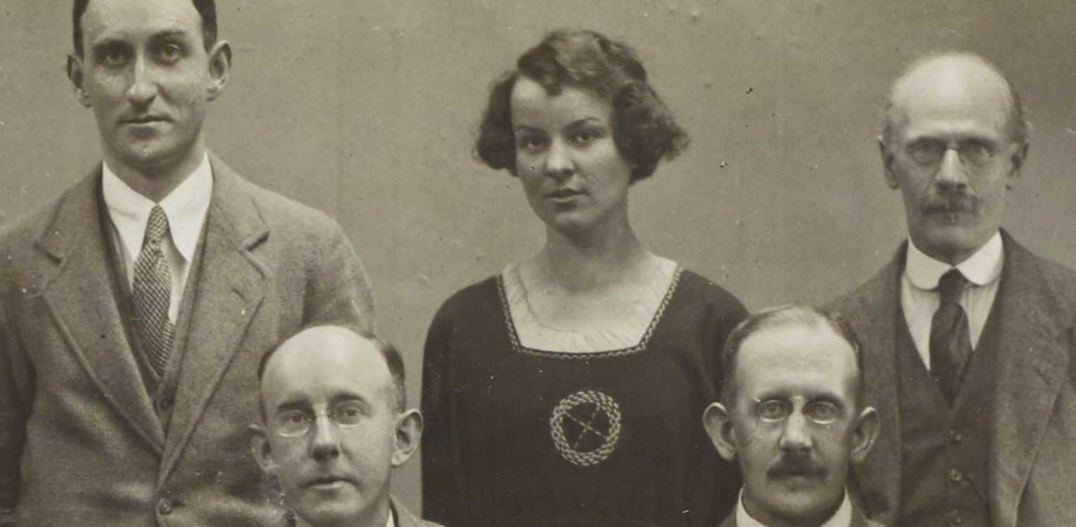 Detail from a photograph showing Madeline Linford at the centre, along with her editorial colleagues from the Manchester Guardian.