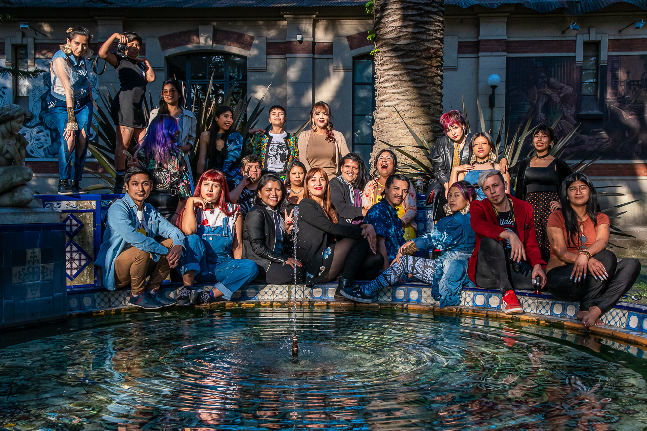 Identidad Marrón collective posing for a group photograph.