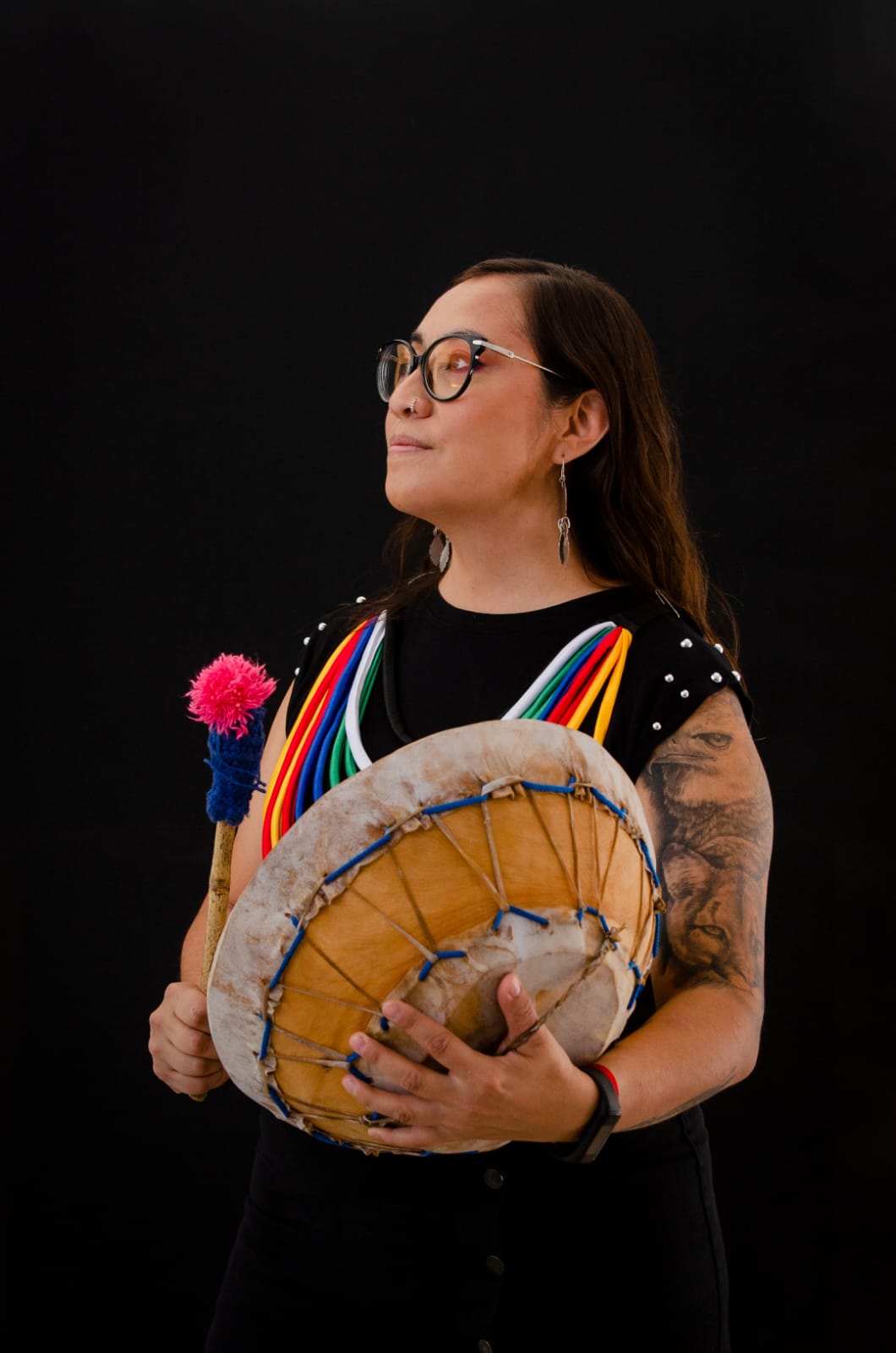 WeWay member poses with the kultrun drum.