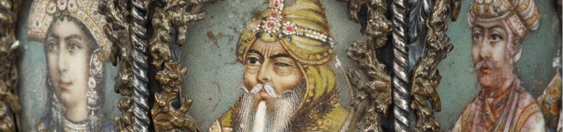 Casket ornately crafted with precious metals, ivory and jewels, with portraits of Mumtaz Mahal, Ranjit Singh, and the Emperor Akbar.