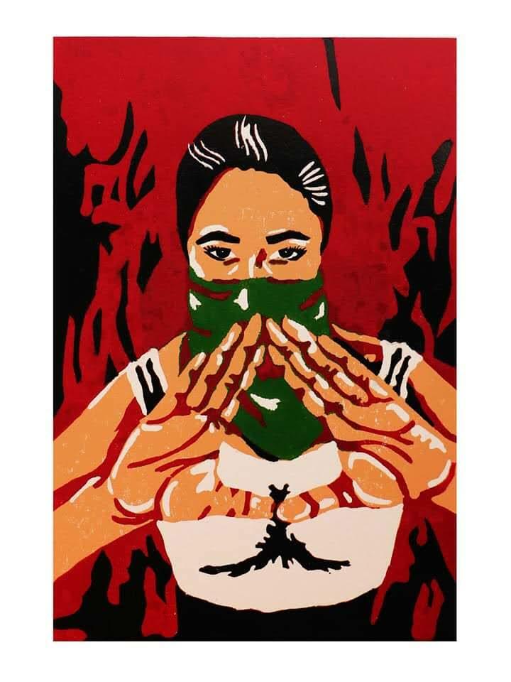 A stylized figure presses hands together at the chest as flames rise behind, rendered in bold red and orange.