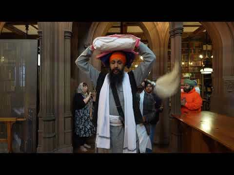 Video showing the Sri Guru Granth Sahib leaving the John Rylands Library and Research Institute.