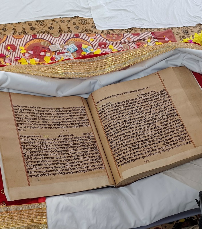 The Guru Granth Sahib at Sri Guru Singh Sabha Gurdwara (Central), Manchester
